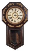 An American drop dial wall clock, the eight-day duration movement striking on a gong,