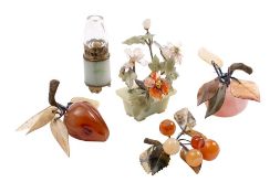 Four hardstone fruit and flower displays together with a miniature lamp, 9cm high.