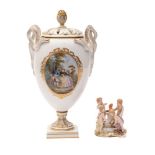 A Meissen pot pourri and cover and a small mythological group of four cherubs the vase with