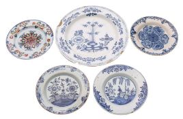 A group of five various 18th century delftware dishes comprising a polychrome plate of Ann Gomm