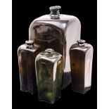 Four mould blown Dutch gin bottles of shouldered square profile with raised everted neck,