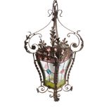 A Victorian wrought iron and glazed hanging lantern of square waisted and tapering form,