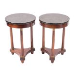 A pair of mahogany, gilt metal and marble mounted gueridons in Empire style,