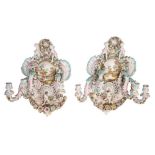 A pair of large German Dresden porcelain four-branch wall sconces,