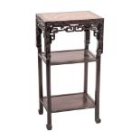 A Chinese carved hardwood and marble inset stand,