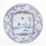 An English delftware 'woolsack' plate probably Bristol,