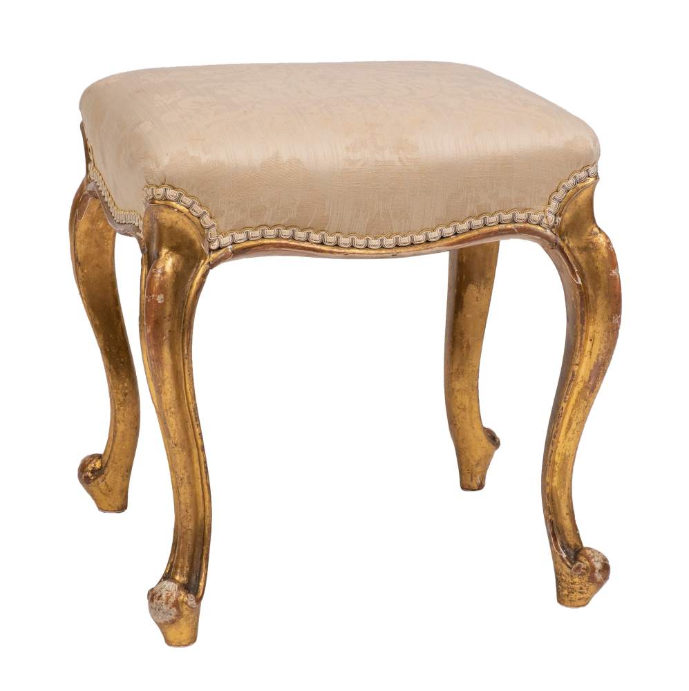 A carved and giltwood and upholstered stool, late 19th century,