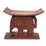 An Ashanti carved and stained hardwood stool, West Africa,