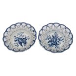 A pair of First Period Worcester blue and white baskets of conventional form with applied florets