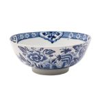 An Isleworth blue and white slop bowl the exterior painted with peony sprays,