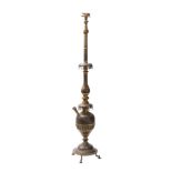 A Middle Eastern brass and niello decorated hookah pipe of traditional design,