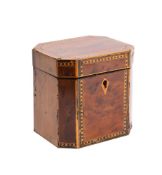 An 18th century yew wood and chequer inlaid tea caddy of rectangular outline with canted corners,