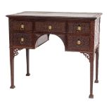 A mahogany kneehole writing table or lowboy in 18th century taste,