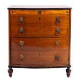A Regency mahogany and satinwood banded bowfront commode chest; early 19th century;