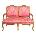 A carved and giltwood and upholstered canapé in Louis XV taste,