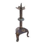 A Limoges enamelled bronze pricket candlestick in early medieval style,