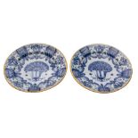 A pair of Dutch blue and white delftware dishes by 'De Griekse A' factory: of conventional design