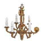 A gilt metal six-branch chandelier the central column with feather pediment and triple columns,