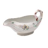 A First Period Worcester polychrome cos lettuce-leaf sauceboat with stalk handle and moulded with