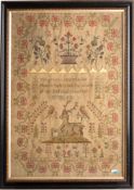 An early Victorian sampler with central verse and stag surrounded by birds and flowering shrubs,