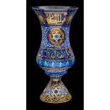 A blue glass vase or lantern,