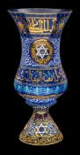 A blue glass vase or lantern,