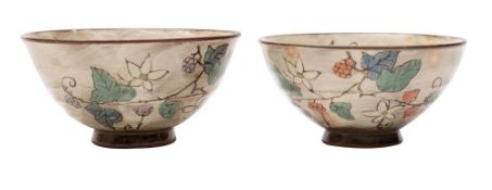 A pair of Japanese contemporary pottery bowls, with floral decoration, seal marks to base,