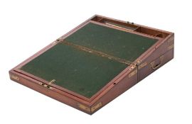 A 19th century mahogany and brass bound campaign writing slope of rectangular outline,