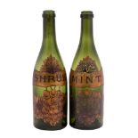 Two 19th century green glass bottles as liqueur decanters with gilt labels for 'SHRUB' and 'MINT',