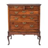 A George III oak chest on stand, circa 1770 and later,