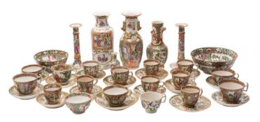 A mixed lot of Chinese Canton famille rose porcelain including a pair of candlesticks, four vases,