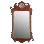 A parcel gilt walnut framed wall mirror in George I style,