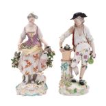 A Derby bocage figure of a shepherdess and a similar figure of a gardener,