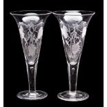 A pair of large trumpet shaped glasses with wheat sheaf and vine decoration,