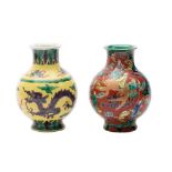 Two Chinese porcelain baluster vases, one painted with Immortals on an iron-red ground,