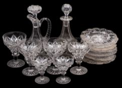 An extensive suite or cut glass goblets of various sizes, decanters and plates.