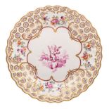 A Derby plate, the painting attributed to Richard Askew with scalloped rim,