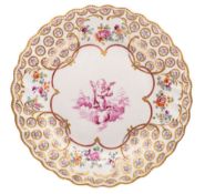 A Derby plate, the painting attributed to Richard Askew with scalloped rim,