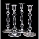 A set of four cut glass candlesticks with knopped and facet cut stems, modern, 29cm.