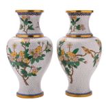 A large pair of Chinese cloisonne vases of ovoid form with prunus blossom,