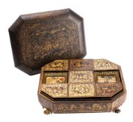 A 19th century Cantonese papier mache and lacquered games box of rectangular outline with canted
