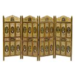 A north west Indian carved and painted wood double sided four leaf room screen,
