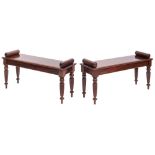 A pair of mahogany hall benches in Regency style,