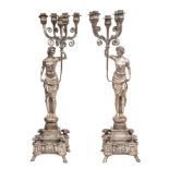 WITHDRAWN A pair of plated metal figural five light standard candelabra in Louis XVI taste,