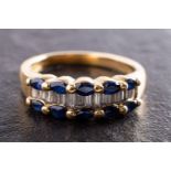 An 18ct gold, sapphire and baguette-cut diamond, three-row, half-eternity ring,