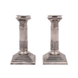 A pair of George V silver candlesticks, maker George Nathan & Ridley Hayes, Birmingham,