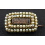 An early Victorian, silver gilt, hairwork and seed pearl sentimental brooch,