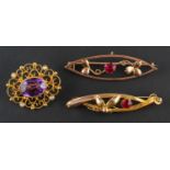 Three openwork, gem-set brooches, including an amethyst and seed pearl brooch,