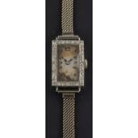 A dress wristwatch, with 16 jewel movement, the rectangular dial with Arabic numerals and blued,