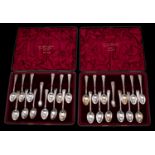 A set of twelve Edward VII silver teaspoons and a pair of sugar tongs, maker James Dixon & Sons Ltd,